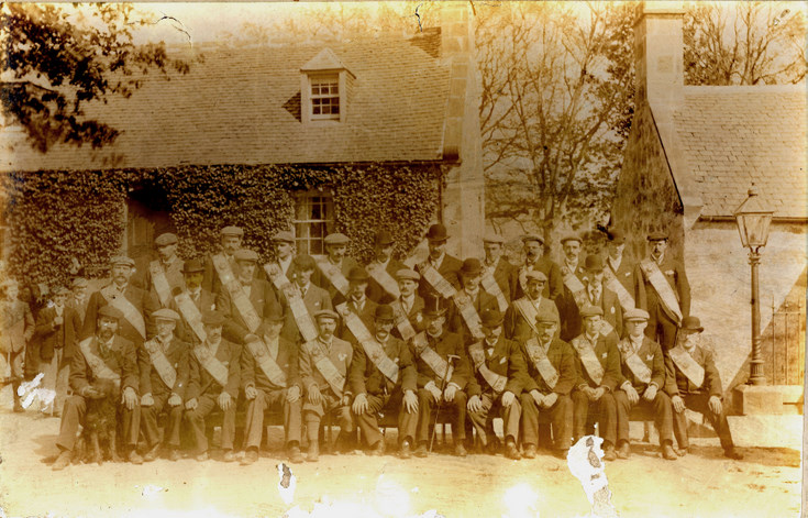 Photograph of a gathering of Freemasons on Cathedral Green