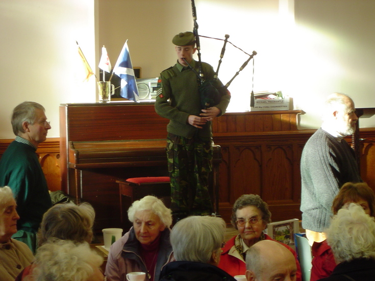 Piper at Dornoch Heritage Society Coffee Morning 11 Nov 2006