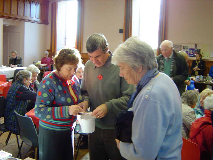 Cliff Reddin and helpers drawing the raffle