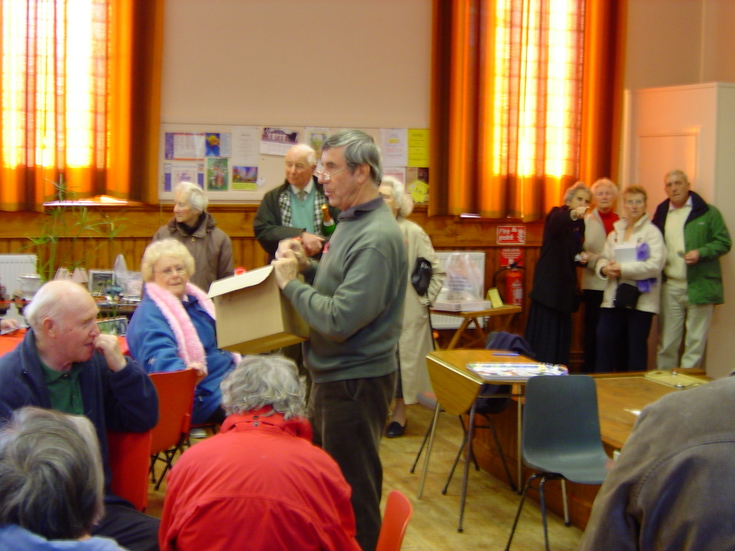 The box with raffle tickets ready for selection