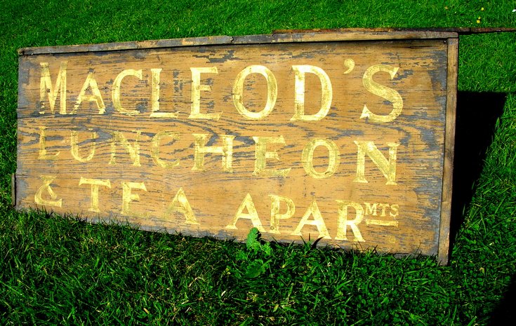 MacLeod's Luncheon & Tea Apartments sign