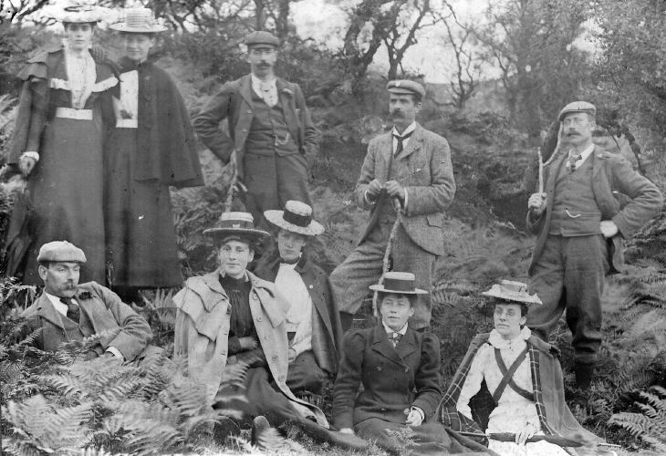 photograph showing party of 6 women and 4 men in wooded area