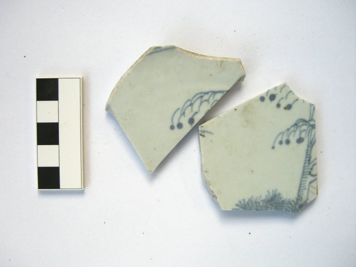 Vitrified pale blue ceramic pottery fragments with blue pattern