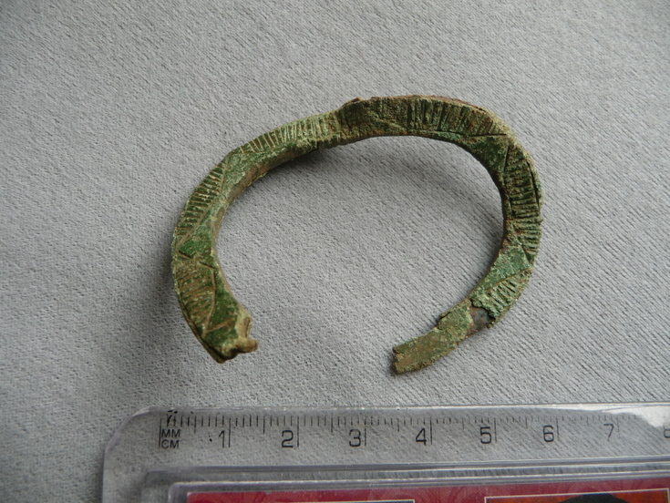 Copper alloy annular brooch