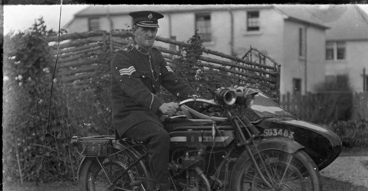 Police Sergeant on motorcyle with sidecar