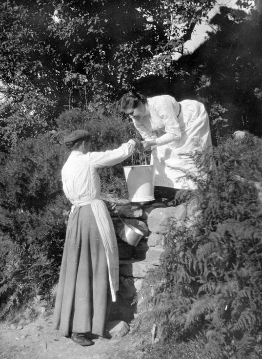 Women with bucket