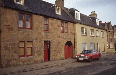 First block to the west of the Library