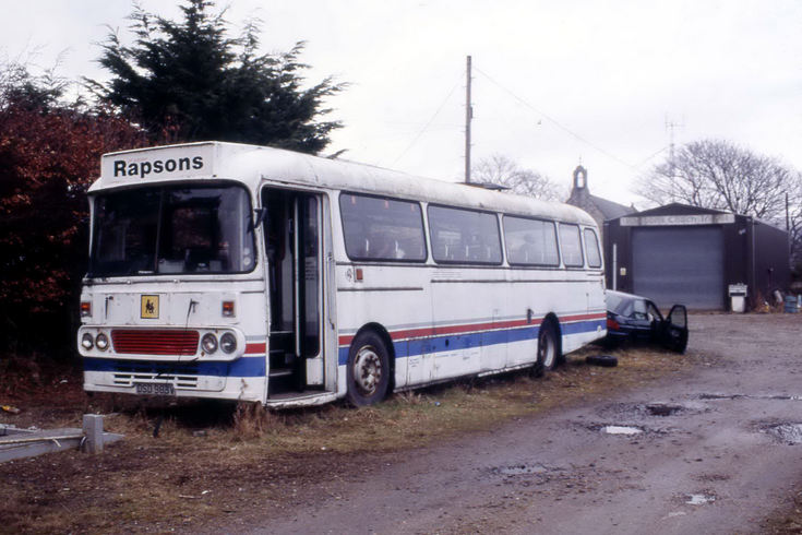 R G H Rapson coach parked at Brora