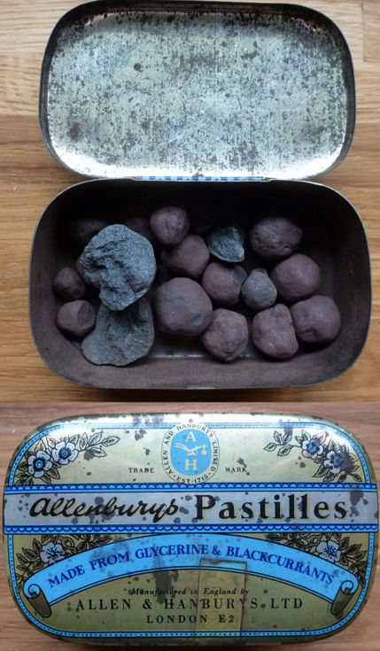 Small tin box containing shot