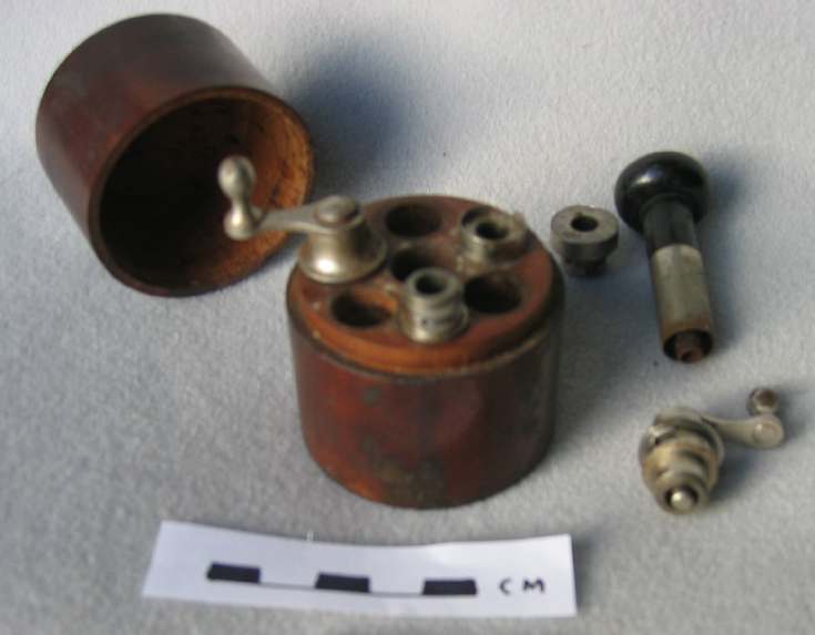 Watch mainspring fitting tool in box
