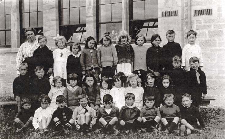 Group photographs and school concert programmes