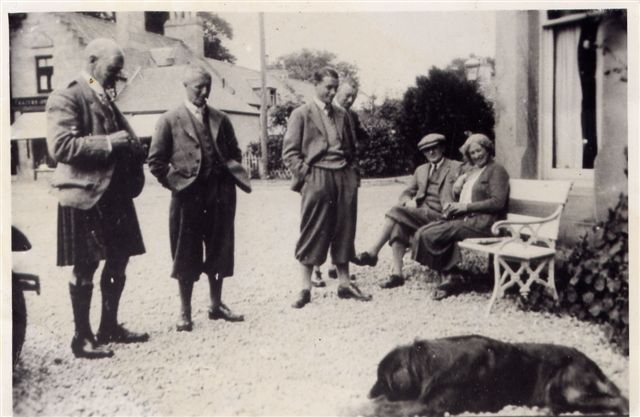 Group of people outside old Sutherland Arms Hotel