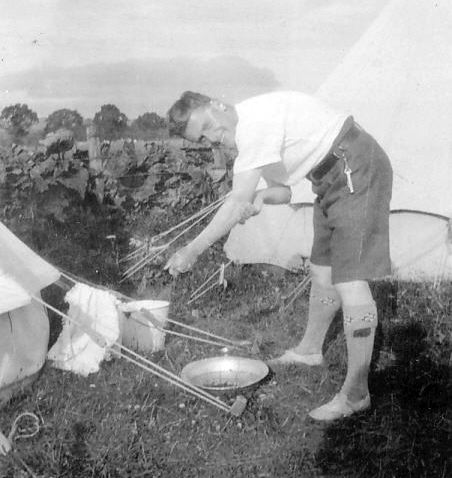 Scout washing at camp