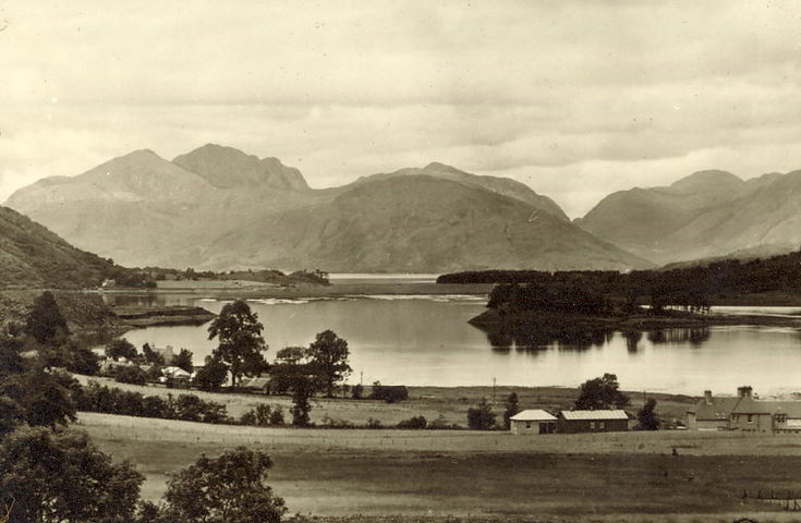 Highland View - houses, loch and mountains