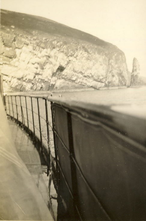 View of cliffs and stack, taken from ship's rail