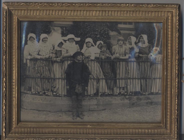 Framed photograph of participants in Dornoch Pageant