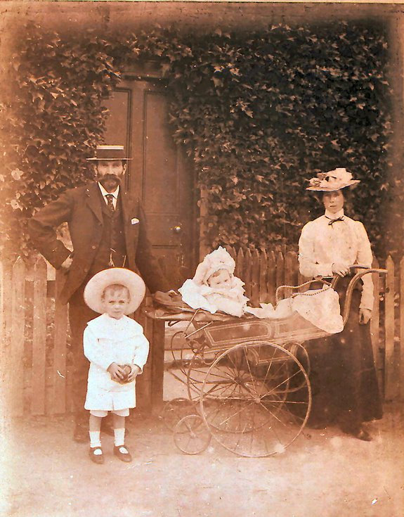 Mr MacLennan, Grocer, with wife, son and baby