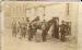 Farriers shoeing horses